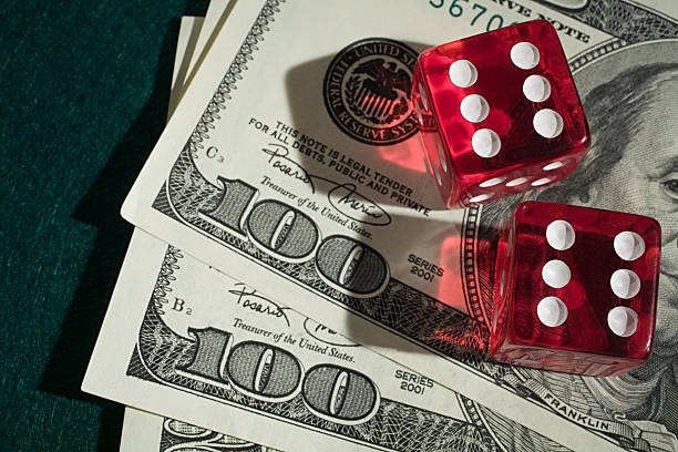 Dealing sequence Dealer distributing three cards to Teen Patti players